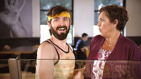 man in sweatband with woman