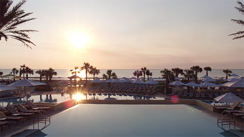 Pool overlooking a sunset
