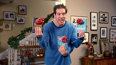 Father with three hands holding games