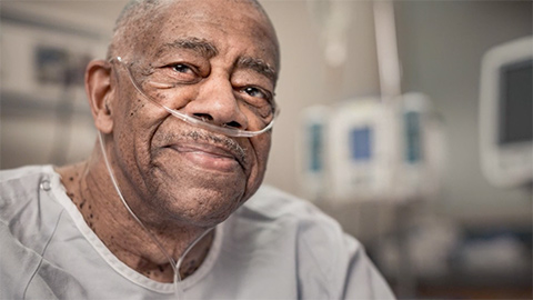 patient with nasal tube providing oxygen