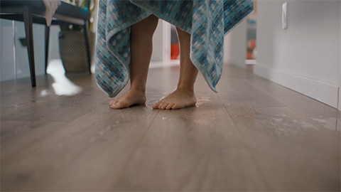 Child's feet on Mohawk flooring