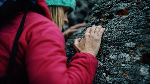 Woman climbing in nature