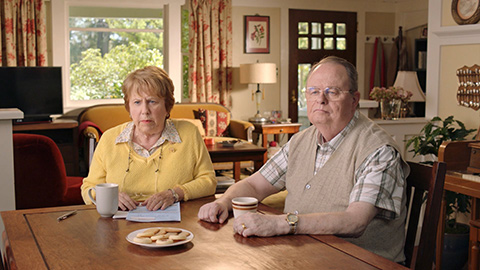 Man and woman sitting at table