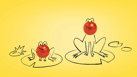 Tomatoes with doodles to look like frogs