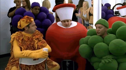 people dressed as apples and grapes