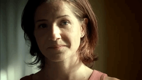 close up of woman looking into camera